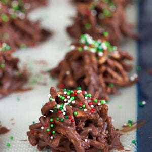 Chocolate haystack cookies on a baking sheet.