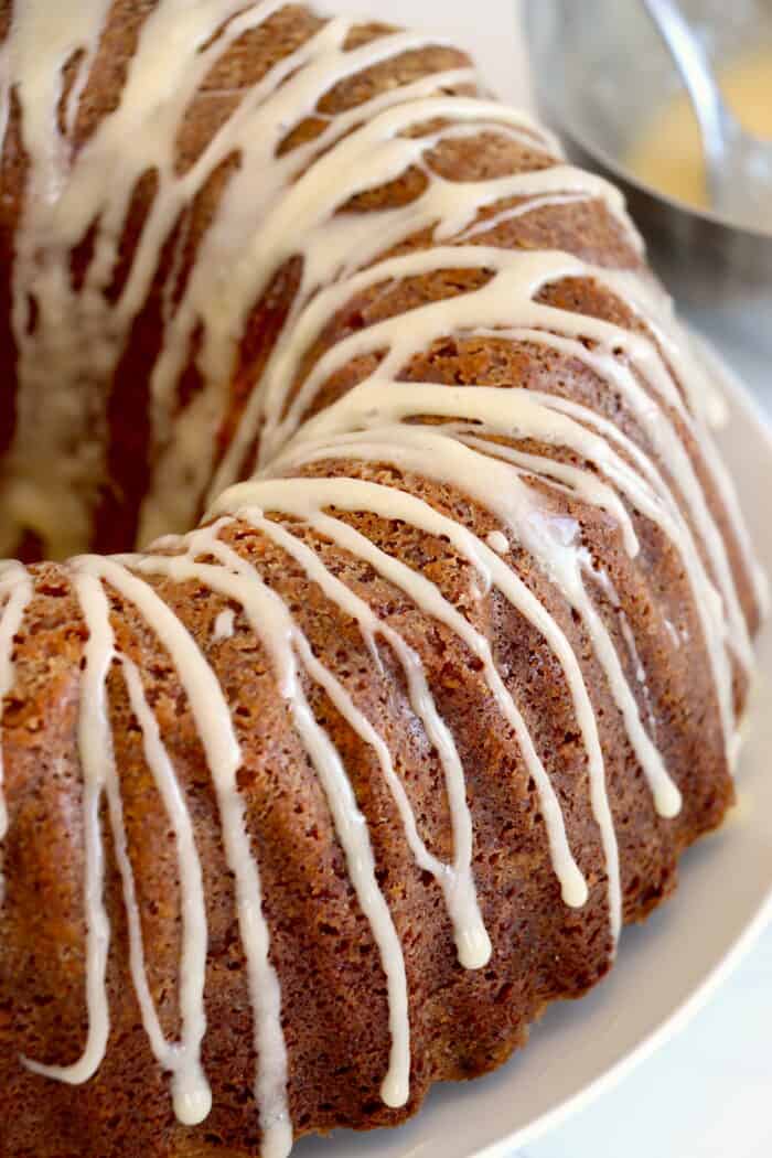 Eggnog pound cake has a white drizzle on it.