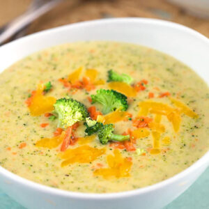 Broccoli Cheddar Soup in a white bowl.