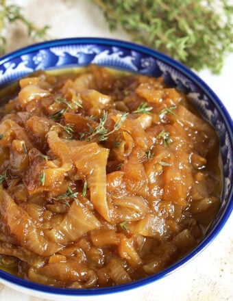 caramelized onions in a blue and white floral bowl