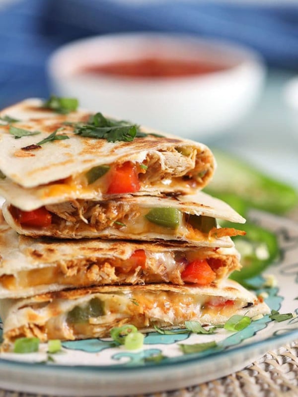 Stack of chicken quesadillas on a plate