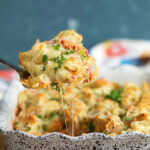 Reuben casserole being served with a spatula from a baking dish.
