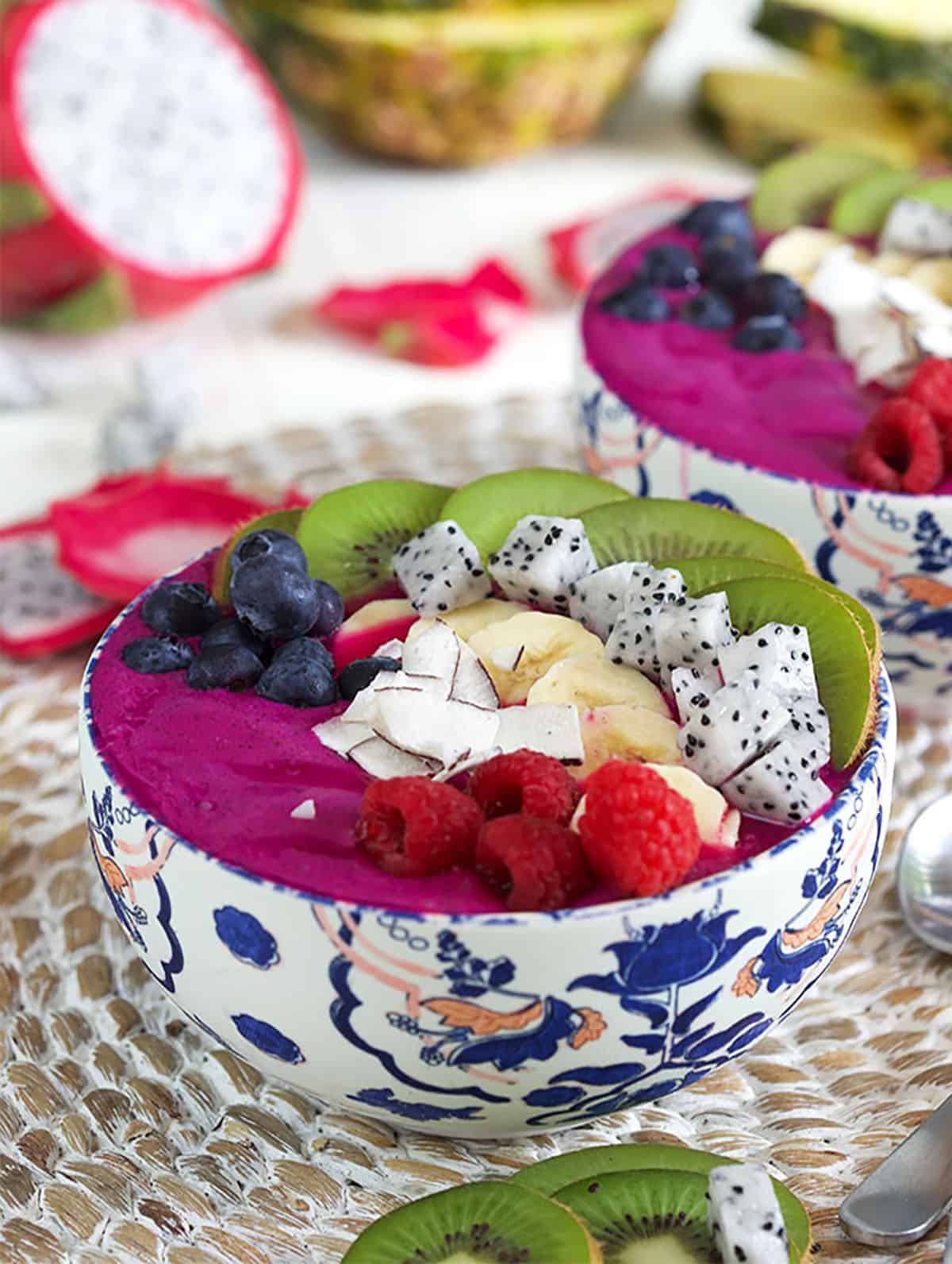 Dragon Fruit Smoothie bowl in a floral bowl