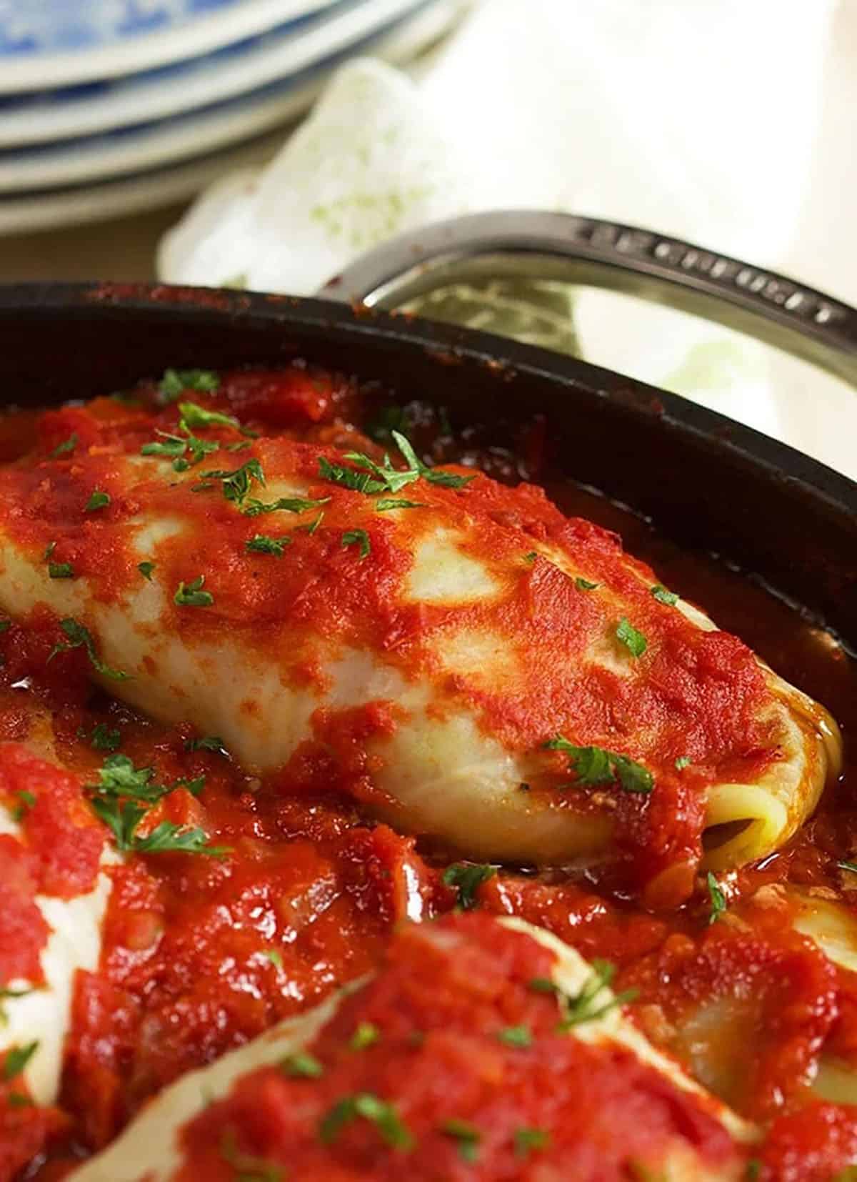 stuffed cabbage roll close up in a pot.