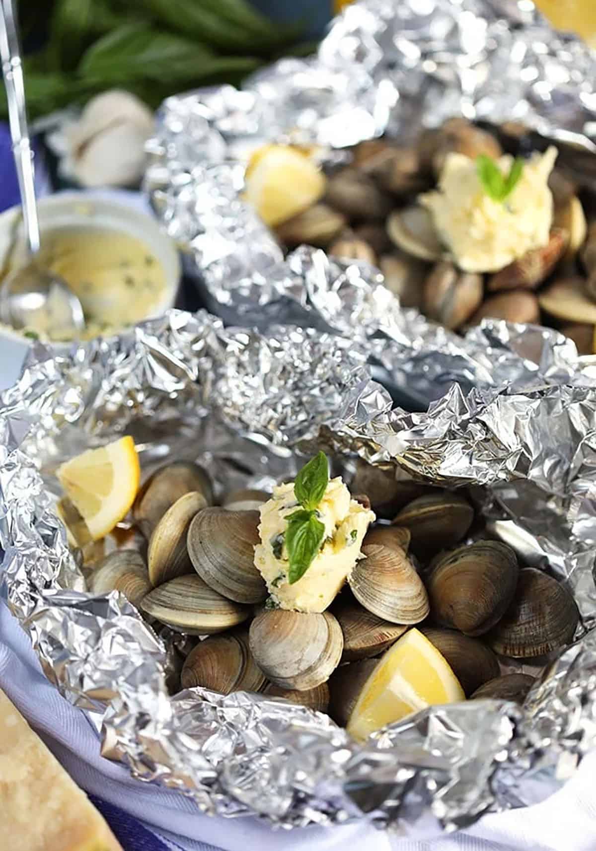 Clams in foil with compound butter.