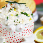 Crab dip in a bowl shaped like a white crab.