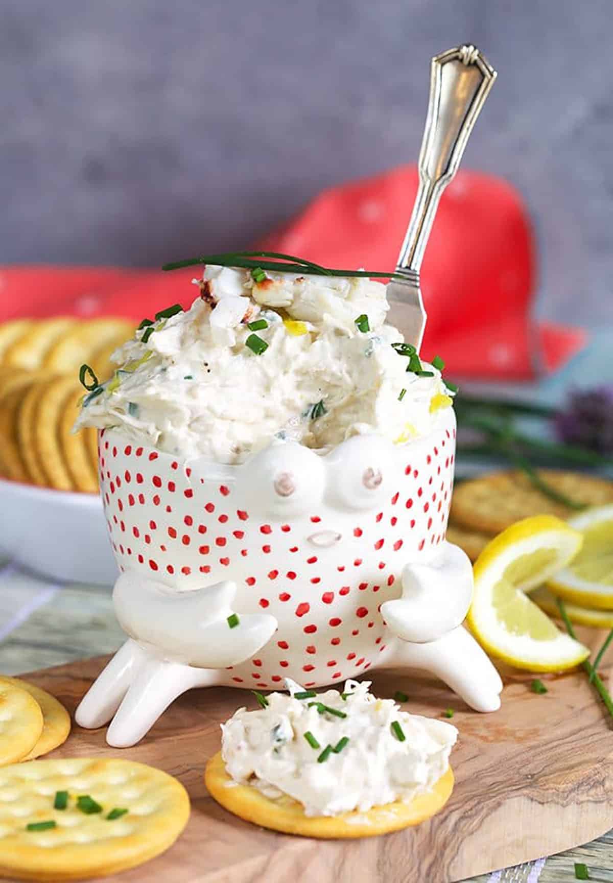 Cold Crab Dip with a spreader in it.