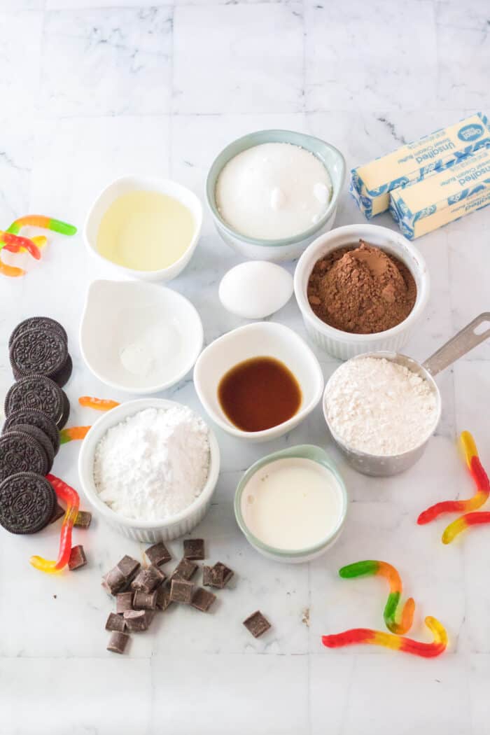 The ingredients for dirt cake cookies are presented on a white countertop.