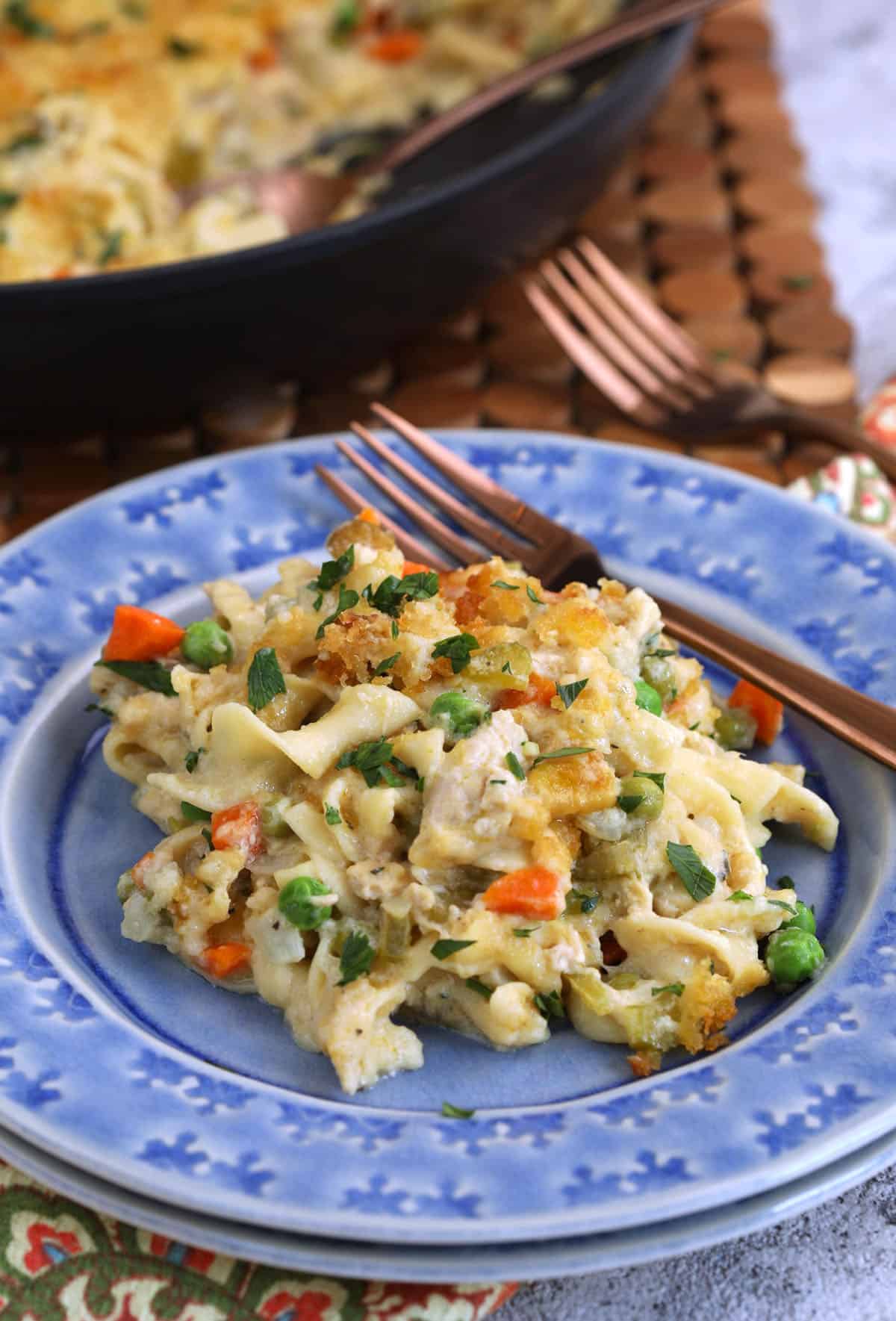 Bowl of tuna noodle casserole with fork