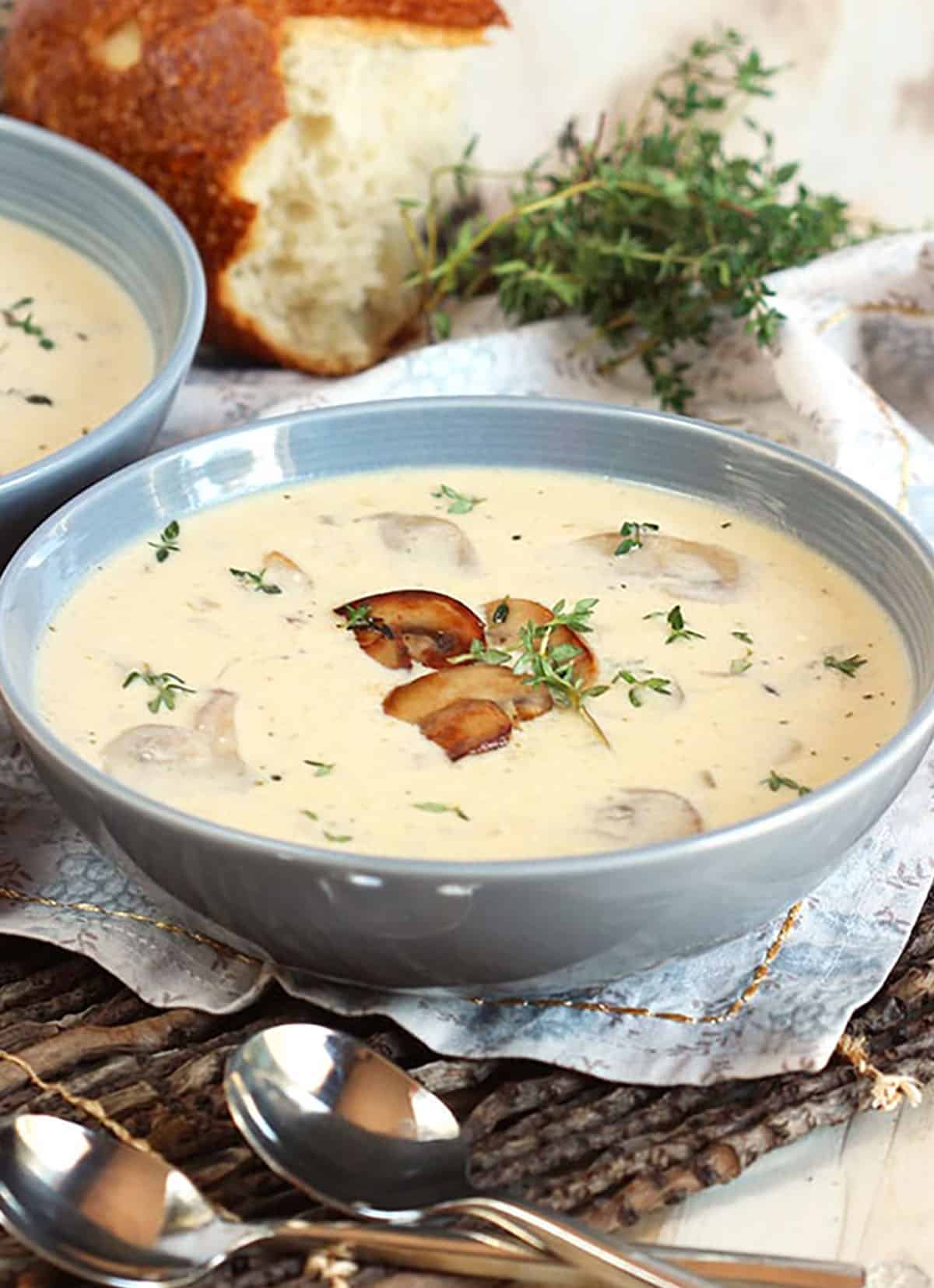 Cream of Mushroom soup in a blue bowl.