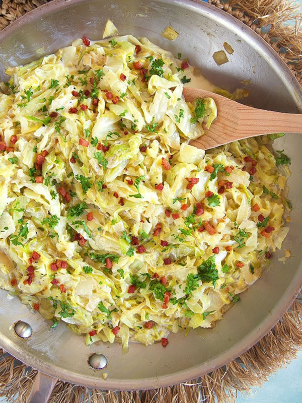 Overhead shot of fried cabbage in a skillet.