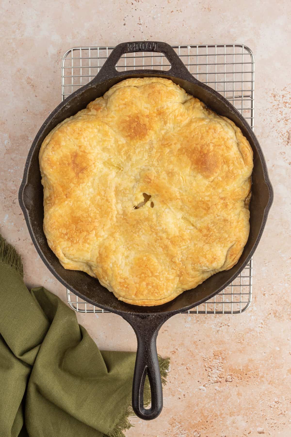 Pear Tarte Tatin in a cast iron skillet after being baked.