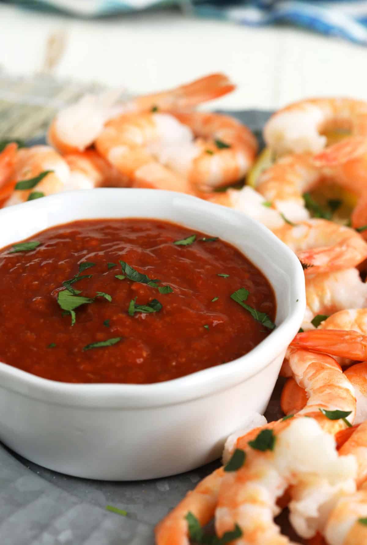 Bowl of homemade cocktail sauce with shrimp