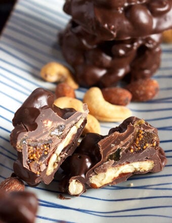 CrockPot Candy cut in half on a blue and white striped platter