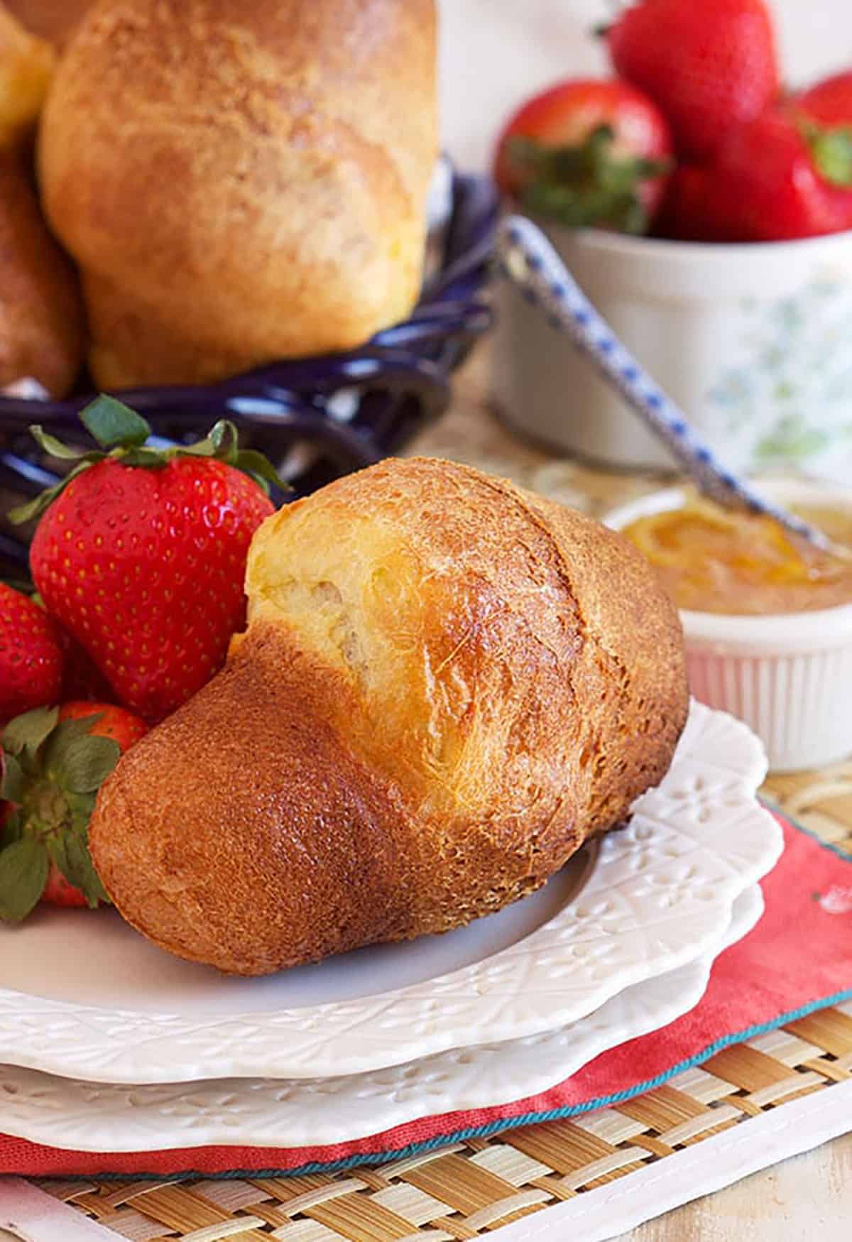 Popover on a plate with a strawberry