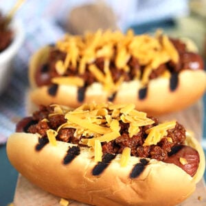 Chili Cheese Dogs on a wooden board