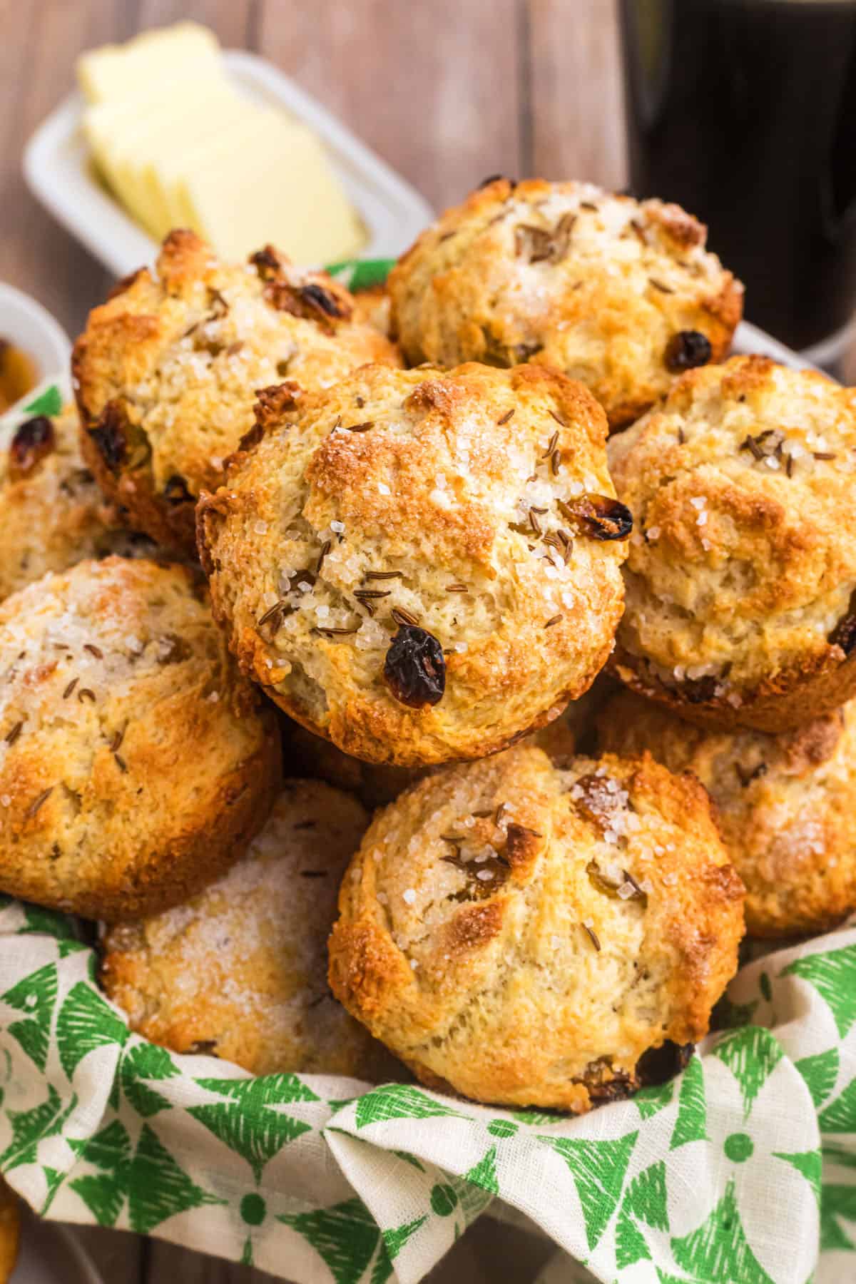 Irish Soda Bread Muffins in a basket with a green and white linen
