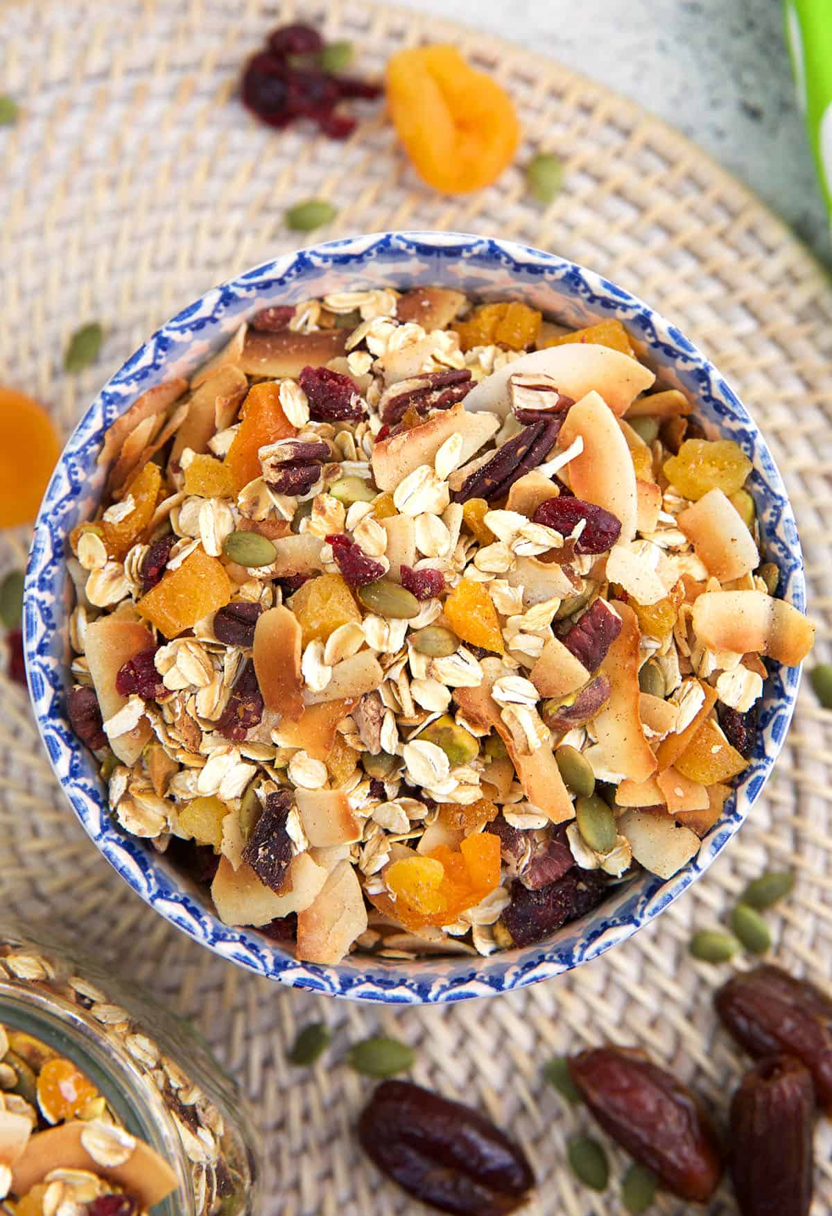 A blue and white bowl is filled with muesli. 