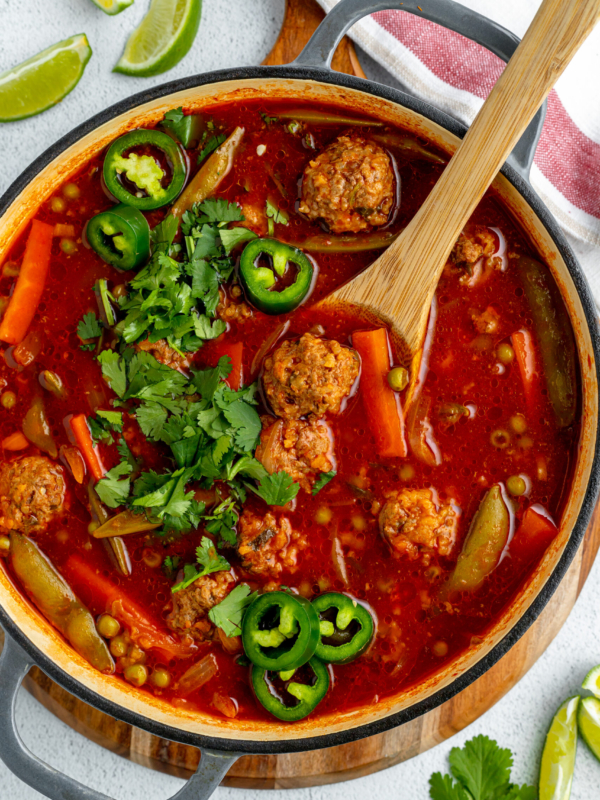 A pot is filled with albondigas soup.