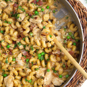 A skillet is filled with chicken bacon ranch pasta.