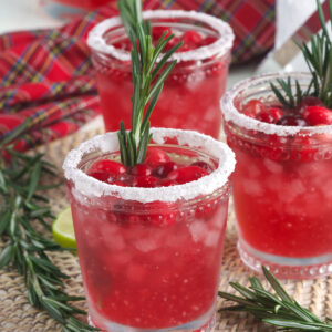 Several glasses are garnished and rimmed with sugar.
