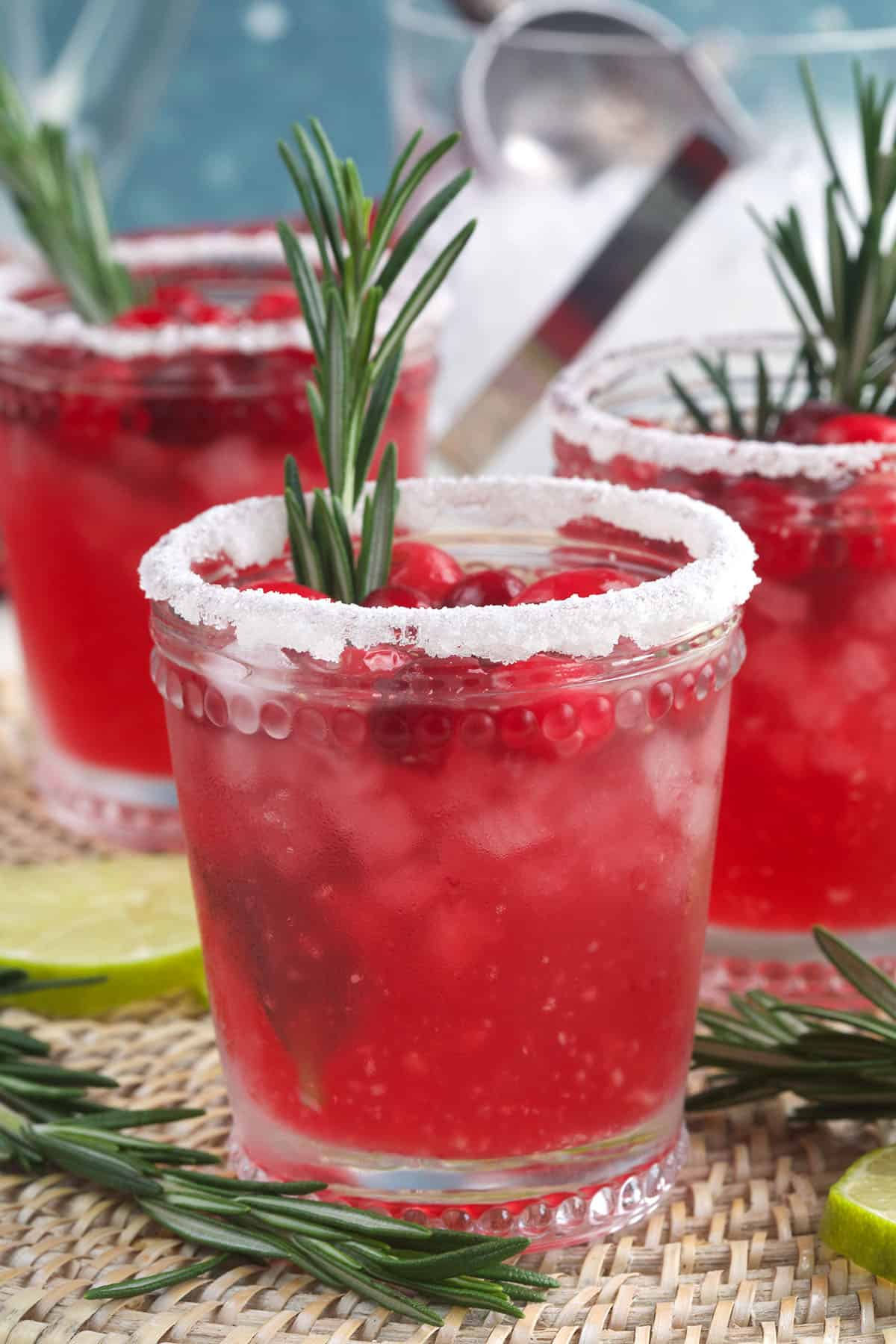 Rosemary garnishes a few glasses of cranberry margaritas. 