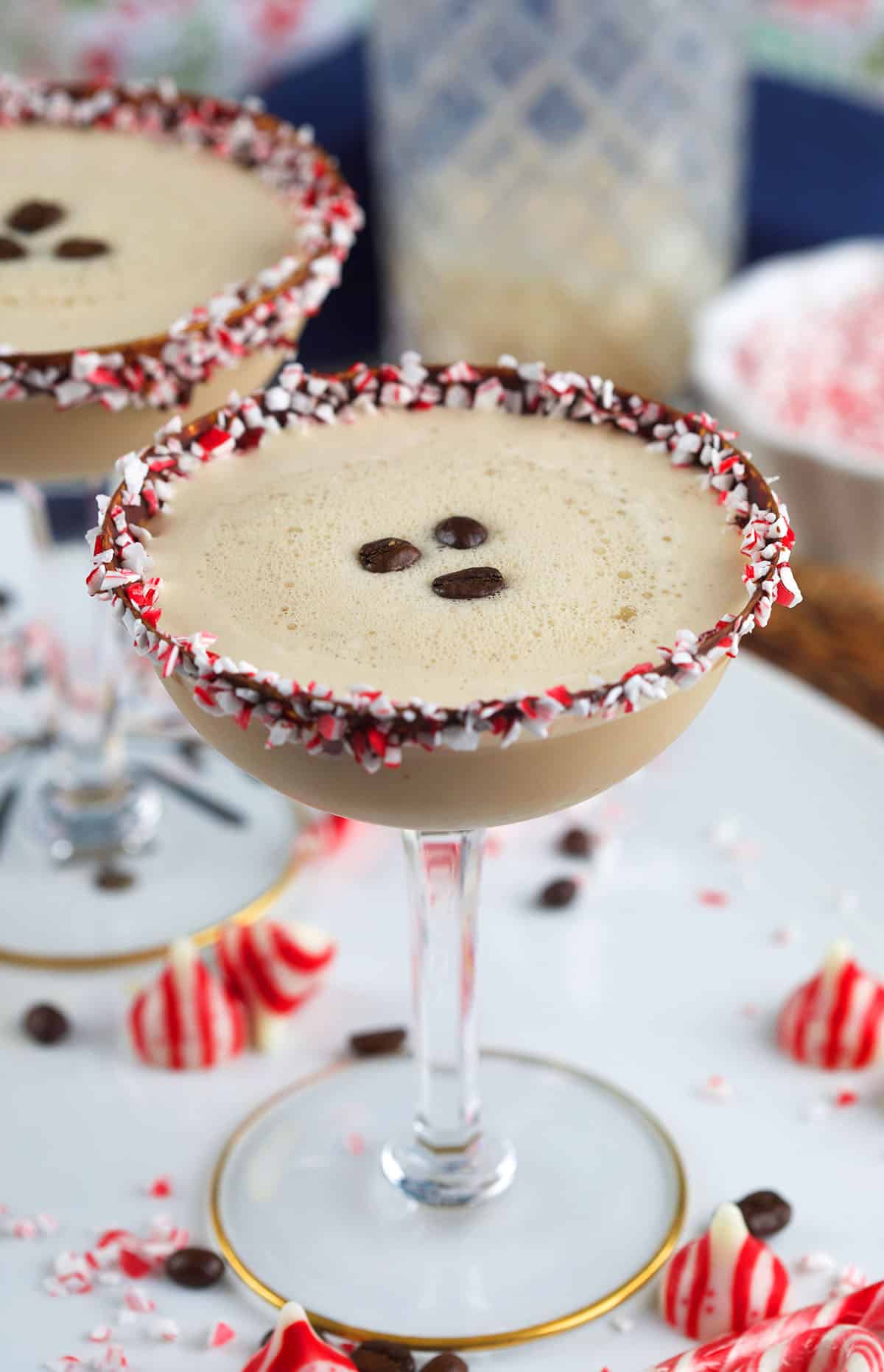 A peppermint martini is garnished with espresso beans.