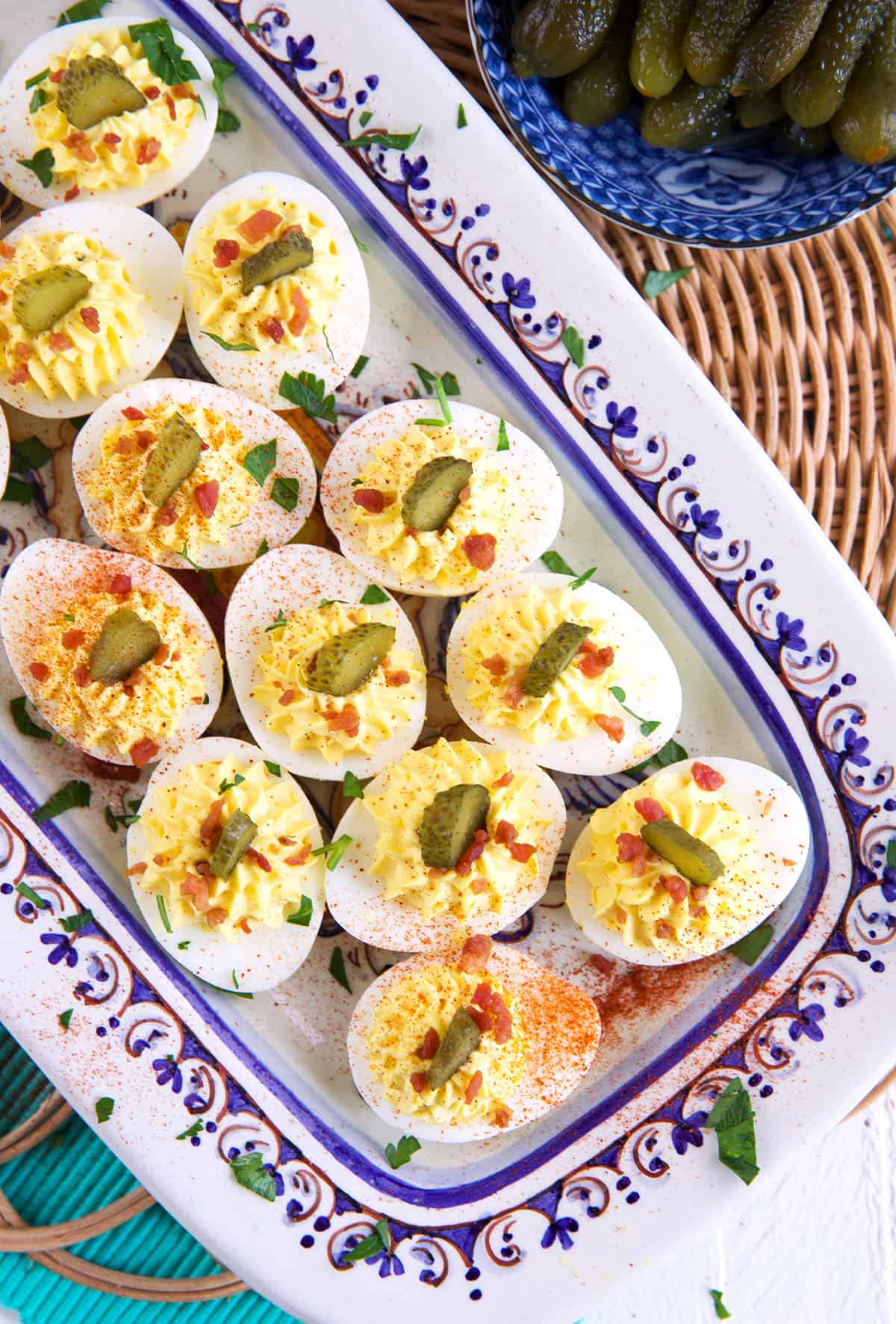 Several deviled eggs are placed on a serving plate. 