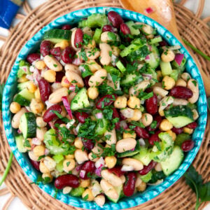 A bowl is filled with three bean salad.