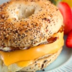 An up close picture shows melted cheese on a sandwich.