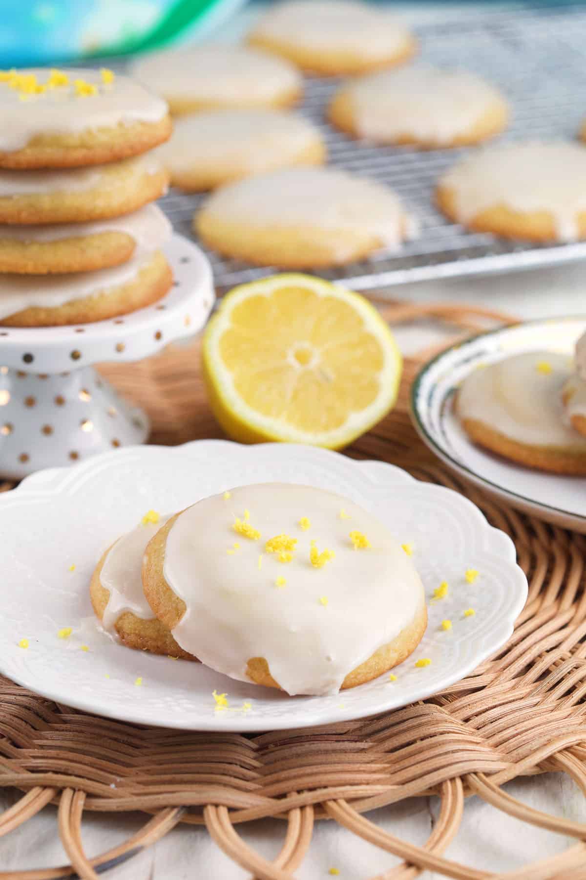 Lemon cookies are all placed around various surfaces. 