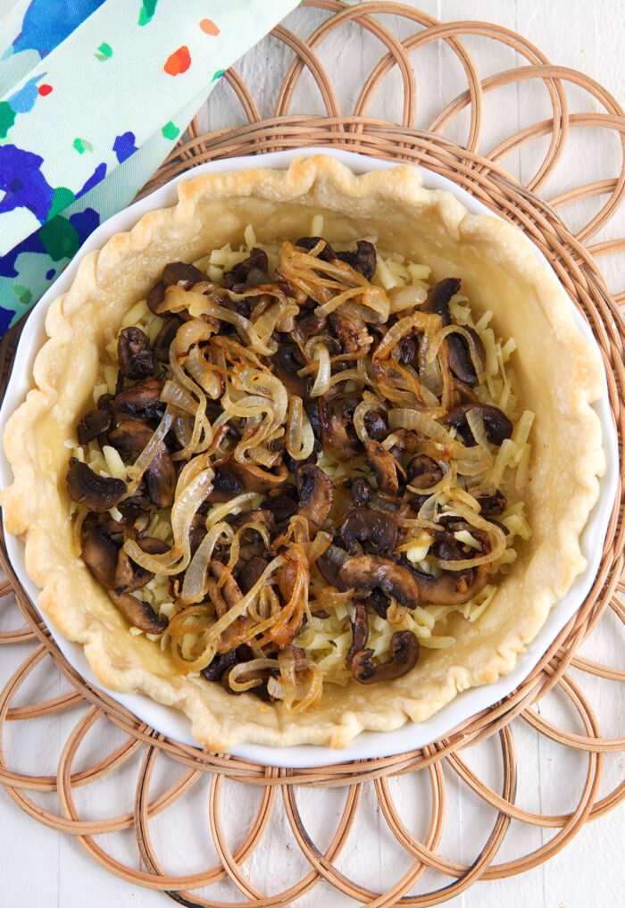 Onions and mushrooms are in the pie crust. 