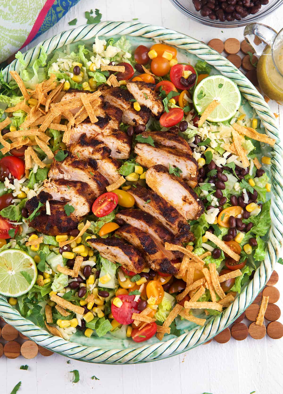 Santa fe chicken salad is plated on a large serving dish. 