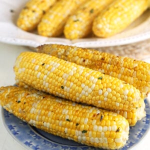 Grilled corn with husks removed