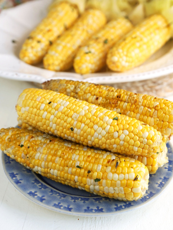 Grilled corn with husks removed