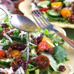 Two plates with house salad