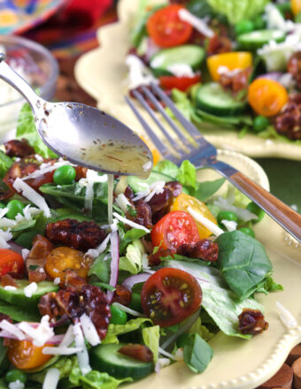 Two plates with house salad