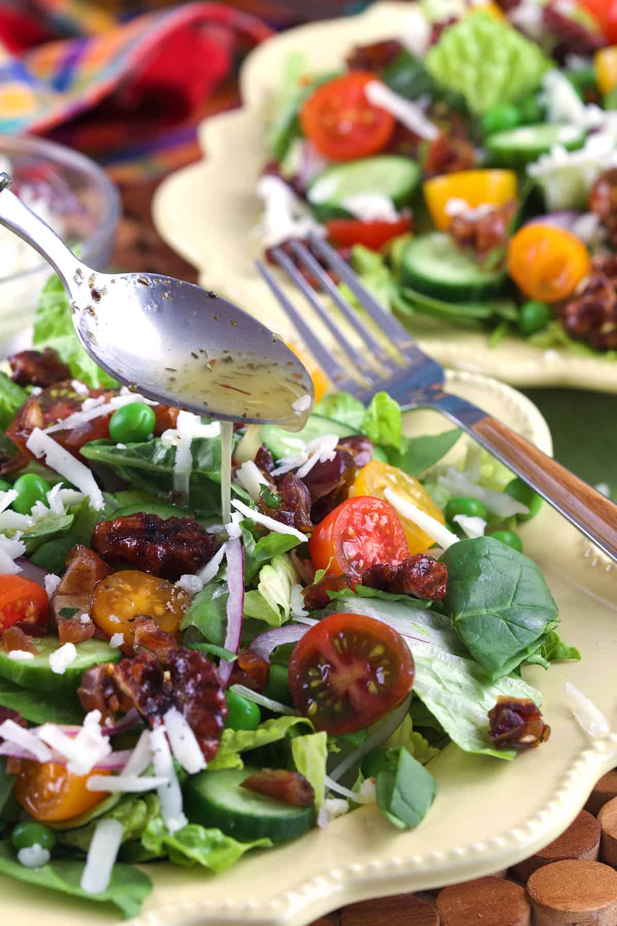 Two plates with house salad