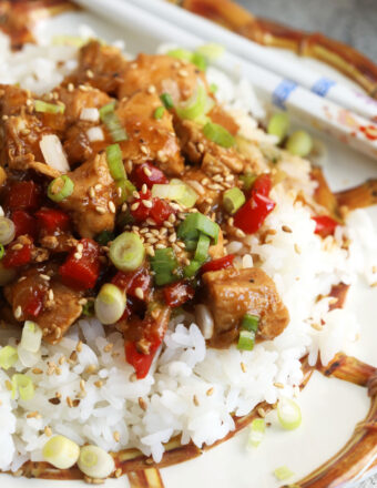 Mongolian chicken served over white rice