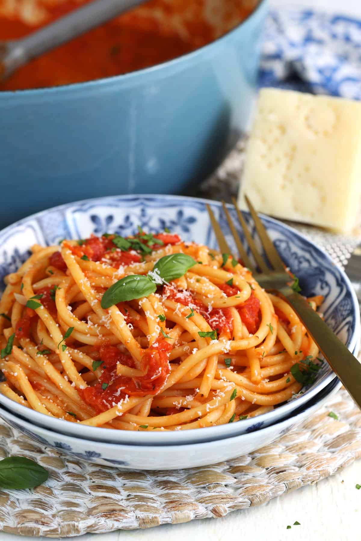 Bowl of spaghetti topped with roasted tomato sauce