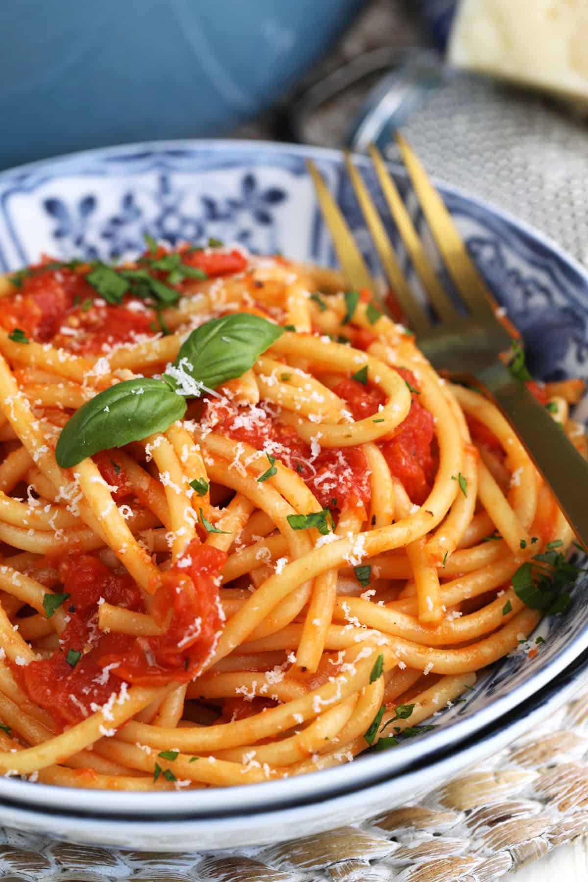 Bowl of pasta topped with roasted tomato sauce