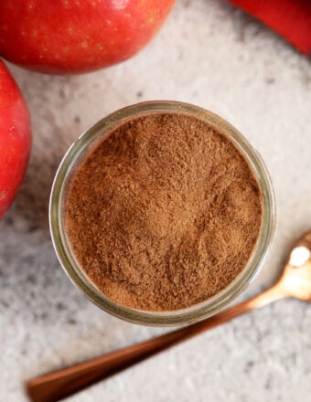 Overhead view of apple pie spice in jar