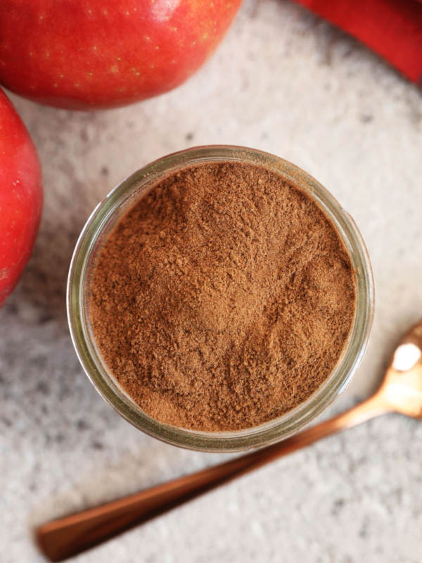 Overhead view of apple pie spice in jar