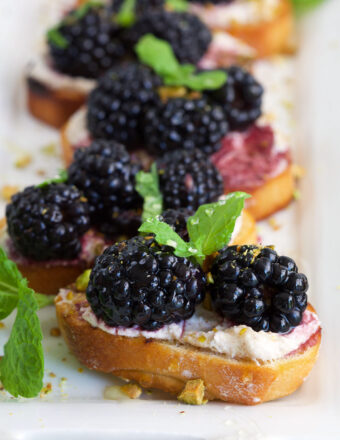 Platter of blackberry goat cheese crostini