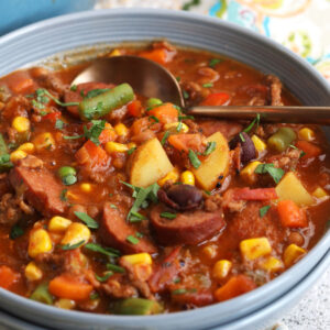 Bowl of hearty cowboy stew with spoon