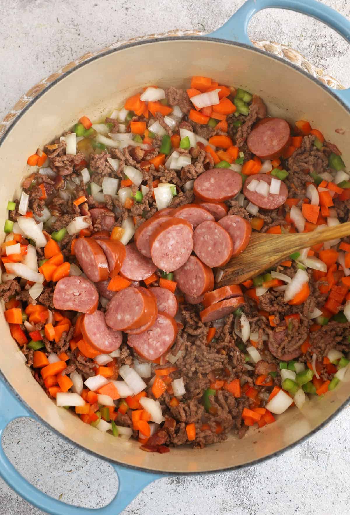 Pouring broth into cowboy stew