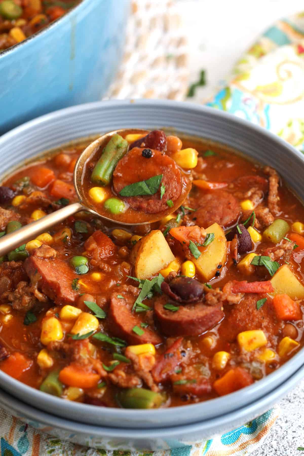 Bowl of cowboy stew with spoon