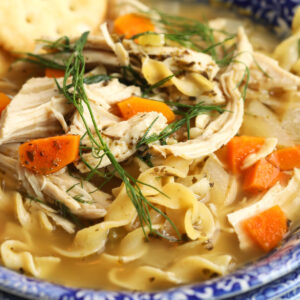 Bowl of crockpot chicken noodle soup