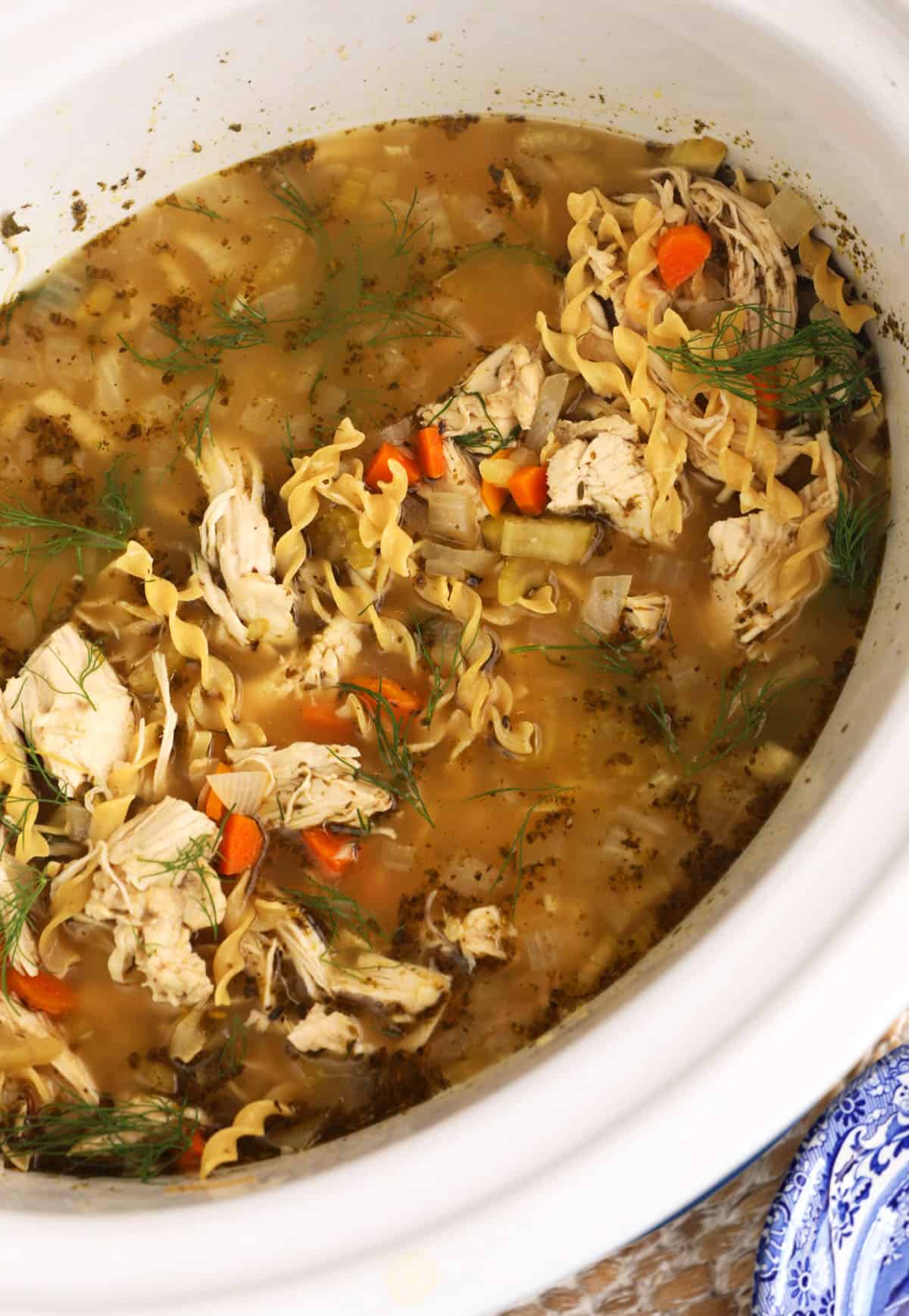 Shredded chicken added back to crockpot chicken noodle soup