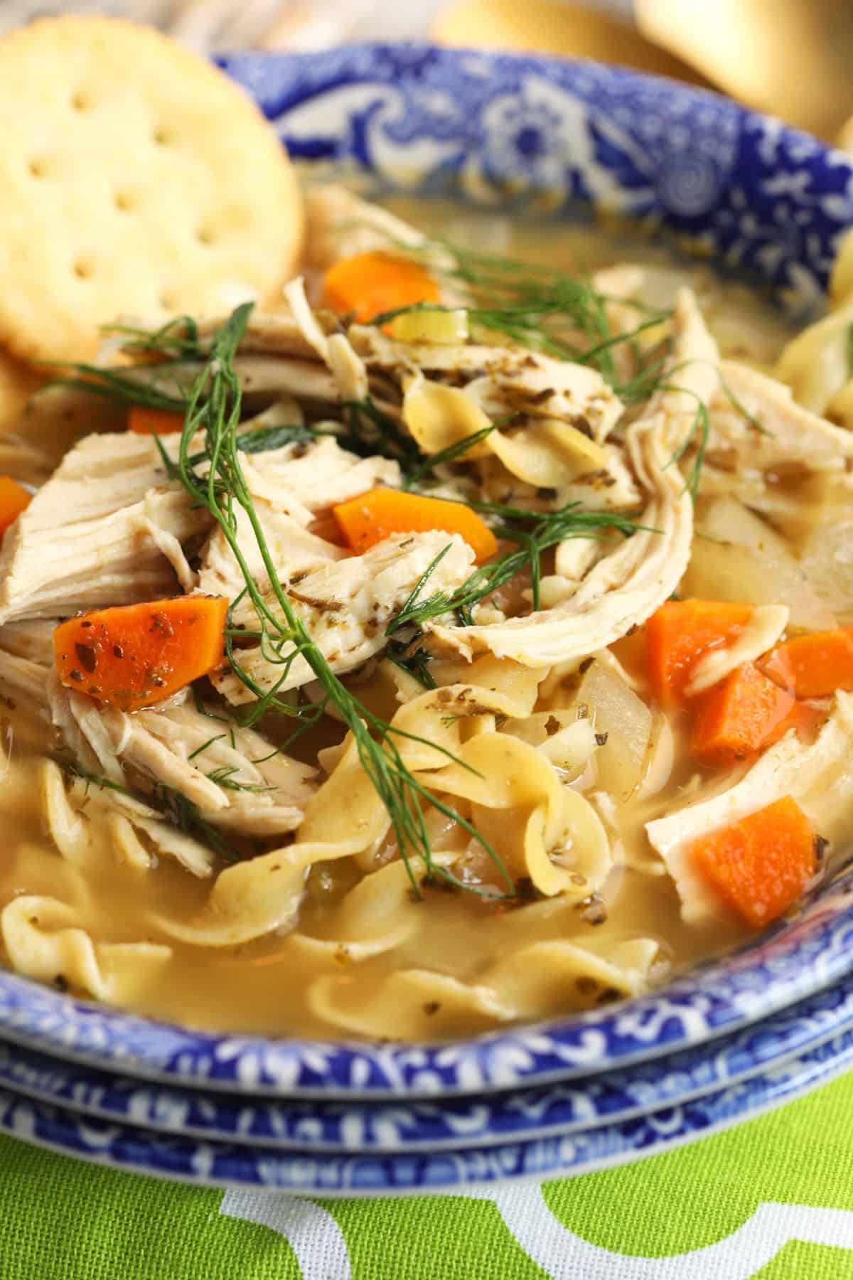 Bowl of crockpot chicken noodle soup